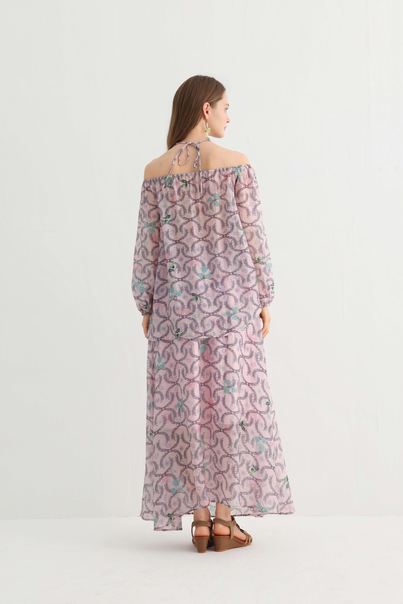 Back view of the off-shoulder floral two-piece outfit