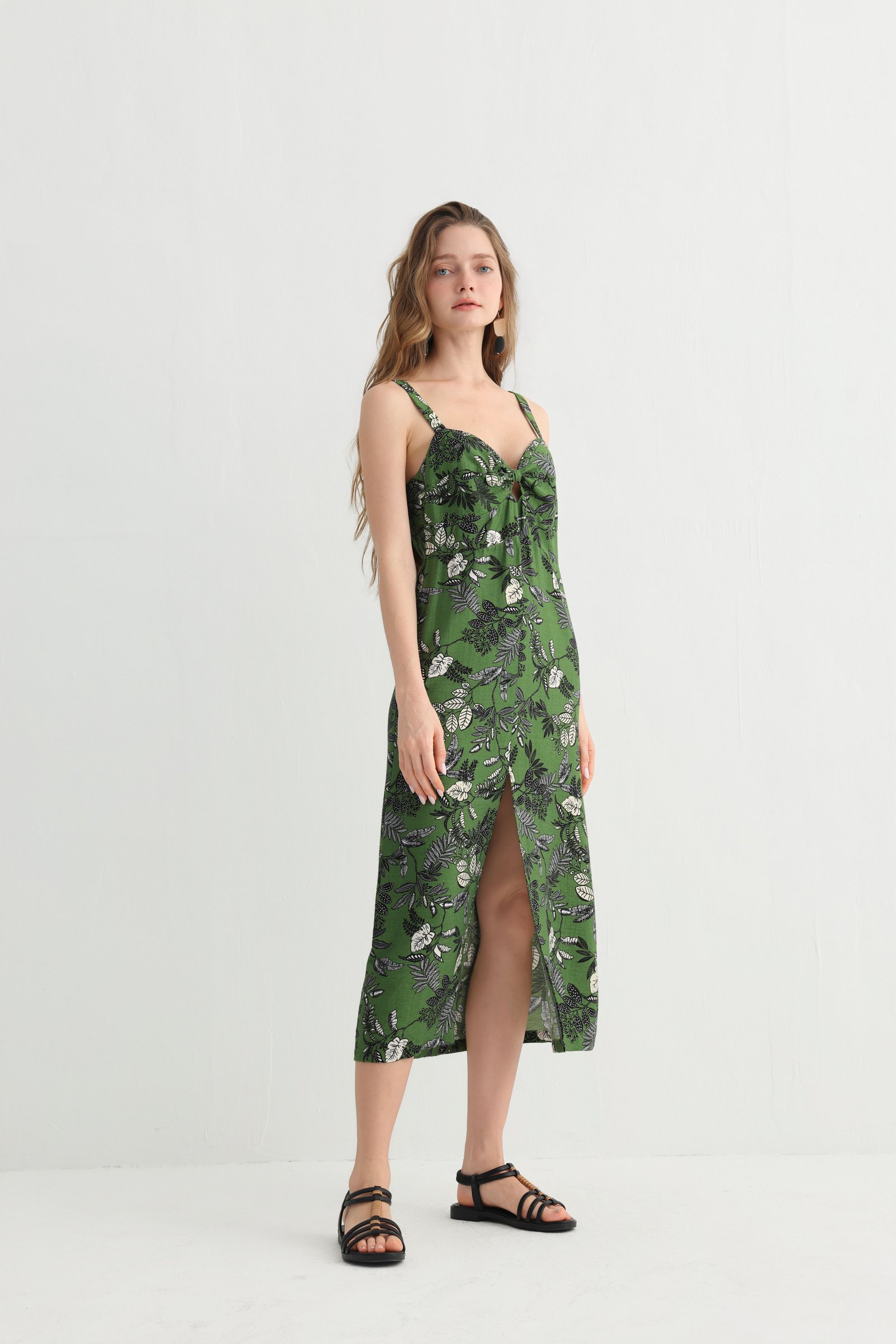 Green leaf print spaghetti strap dress side view