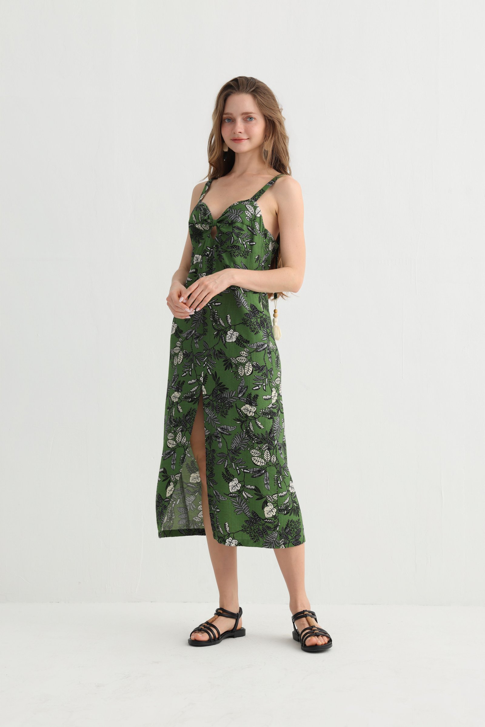 Green leaf print spaghetti strap dress front view
