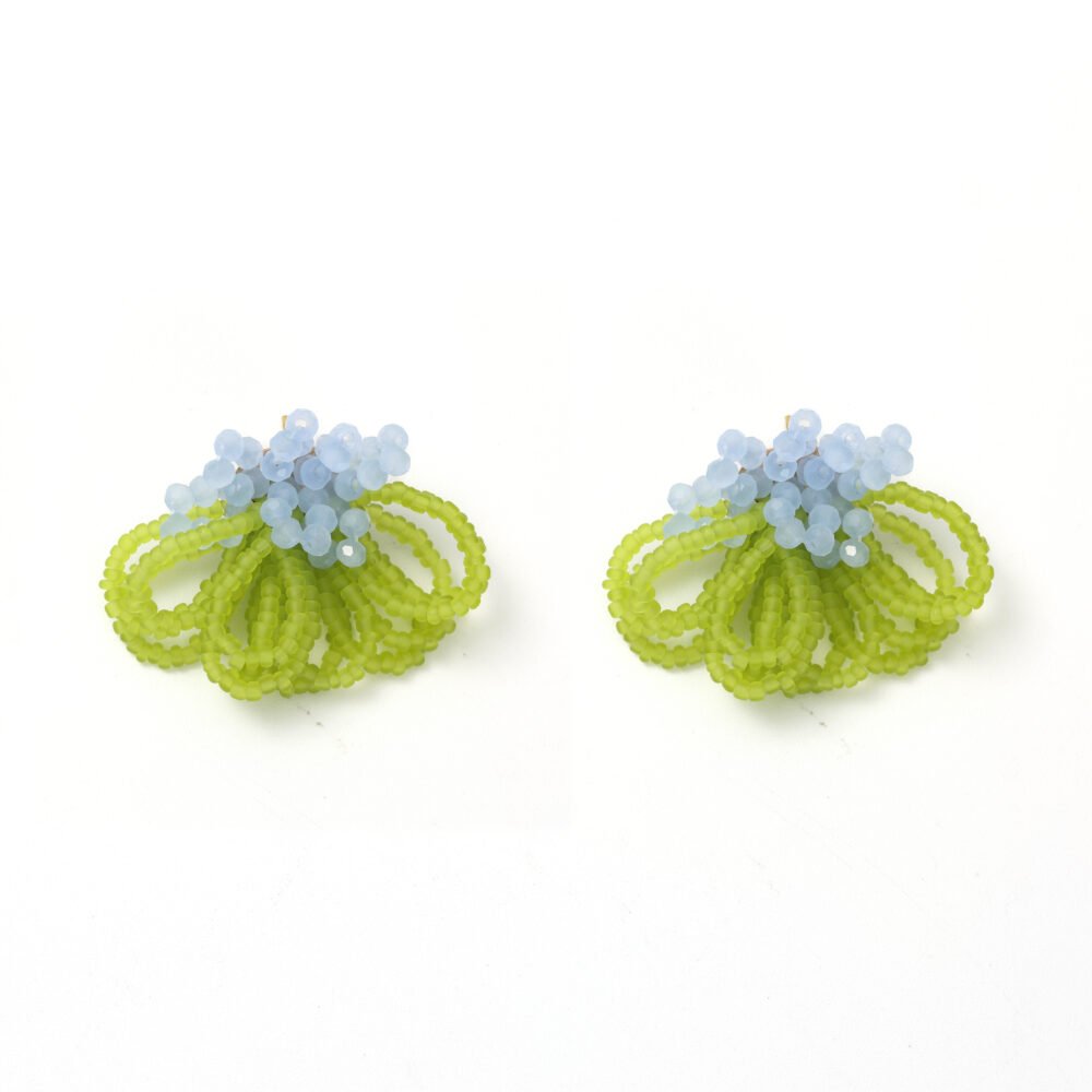 Grass green beaded flower drop earrings with pale blue bead accents on a white background