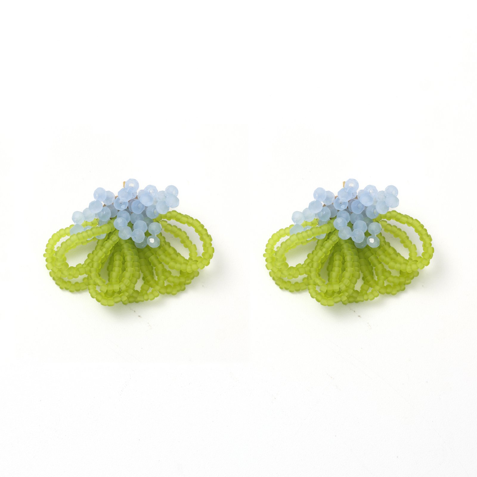 Grass green beaded flower drop earrings with pale blue bead accents on a white background