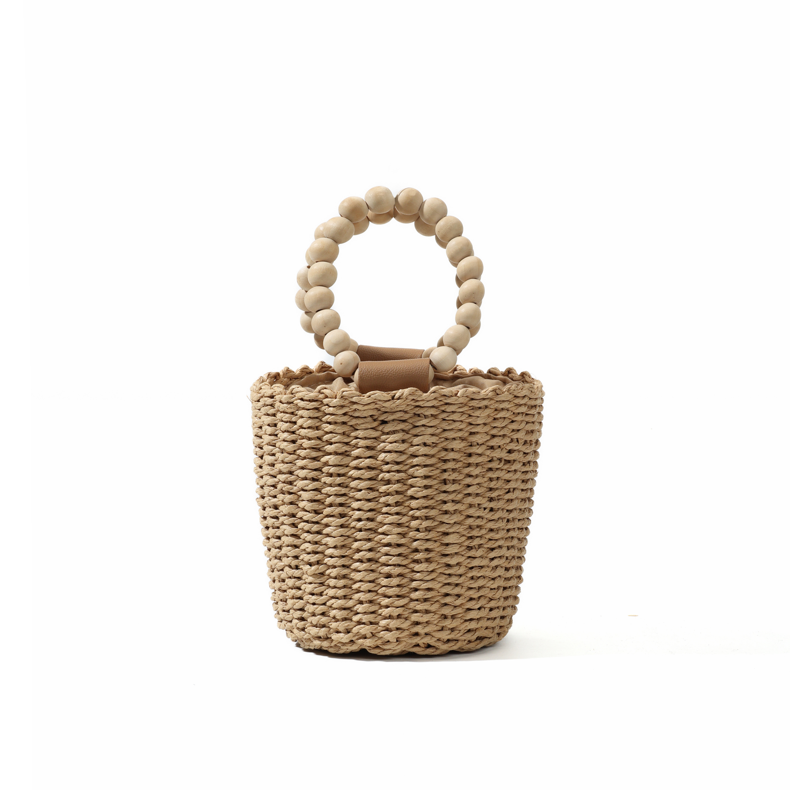 Woven straw bucket bag with oversized round wooden bead handles