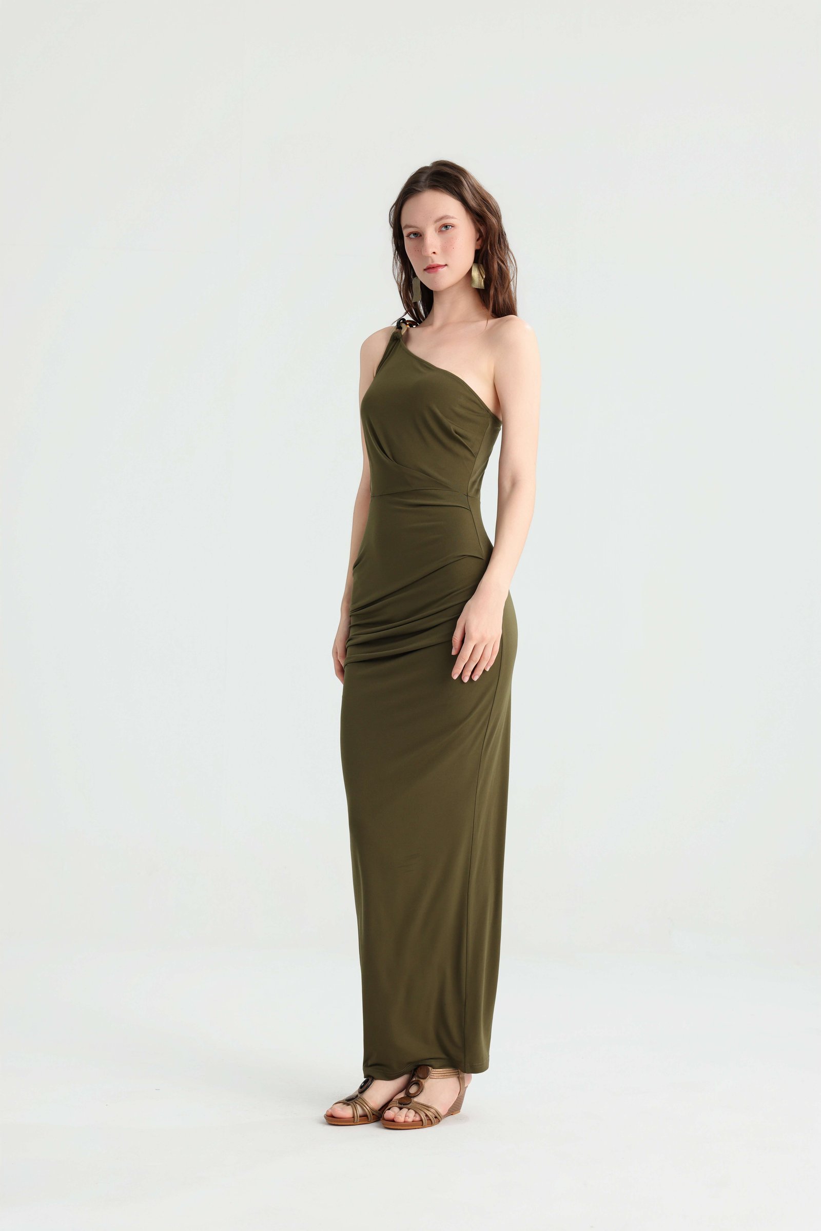 Angled front view of the olive ruched bodycon maxi dress