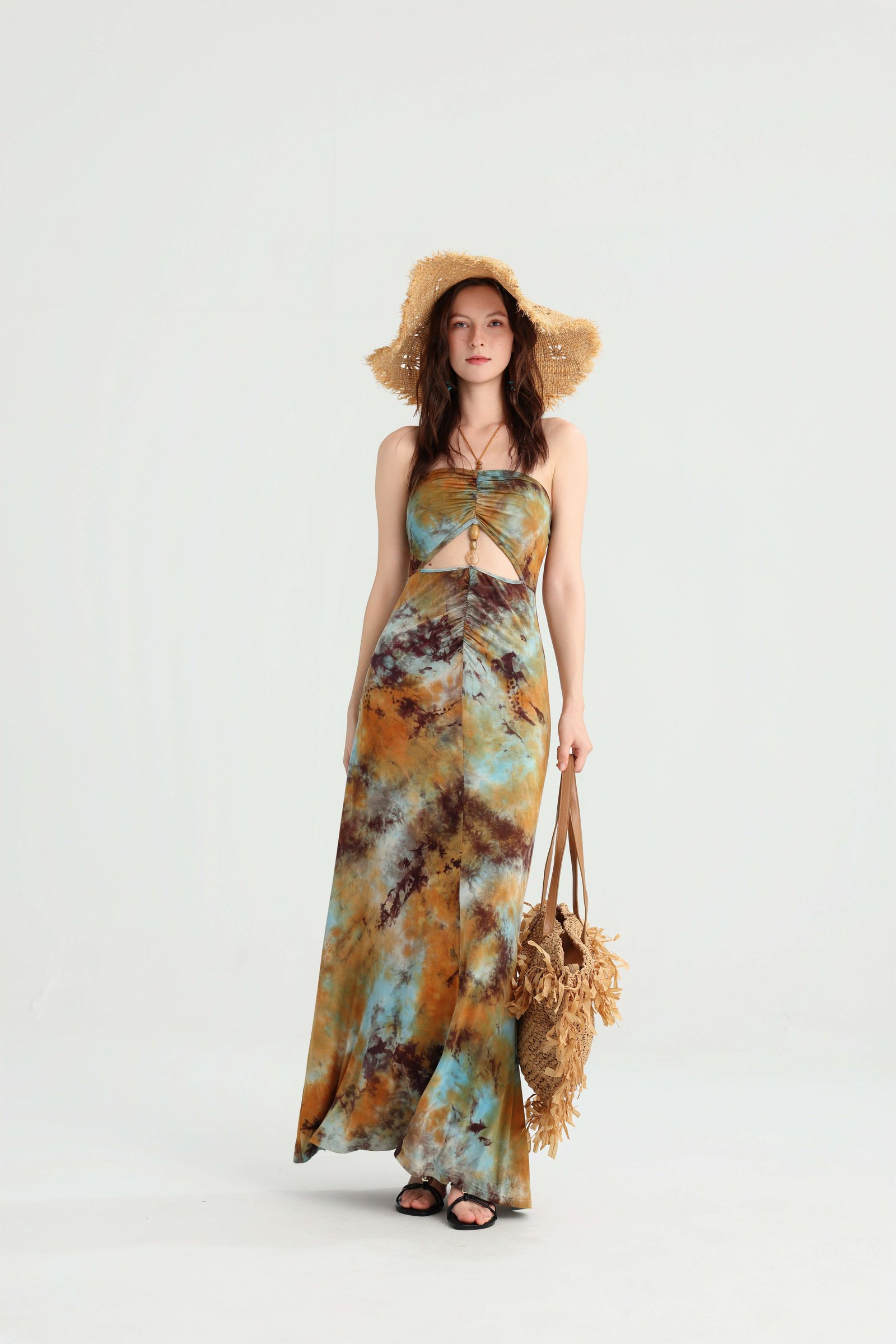 Gold bead detail on tie-dye strapless maxi dres