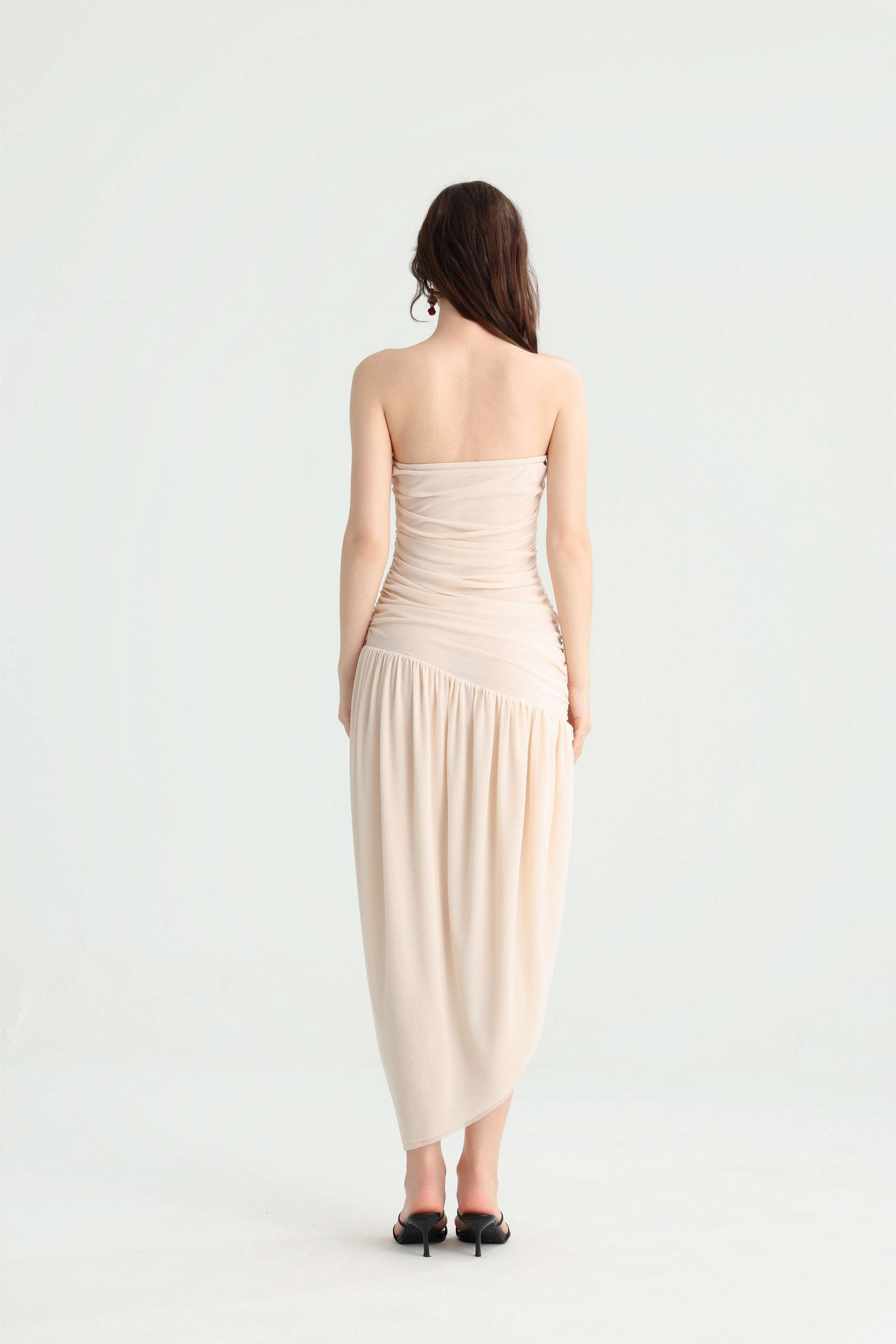 Back view of the cream strapless ruched dress
